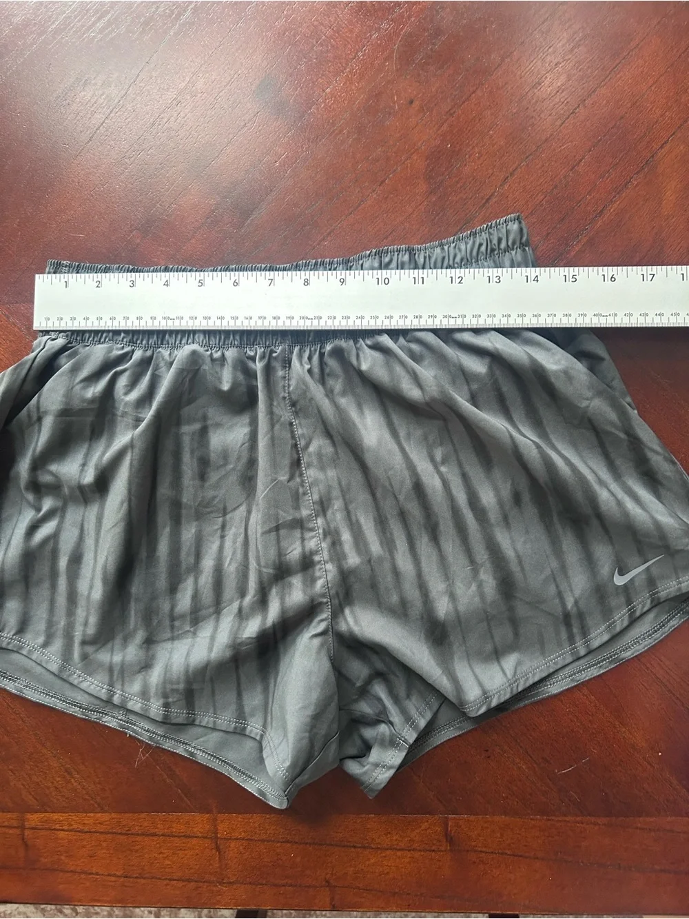 Nike Women's Dark Charcoal Athletic Shorts with Subtle Stripe size M